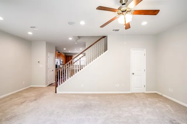 an entryway in a hall with a window