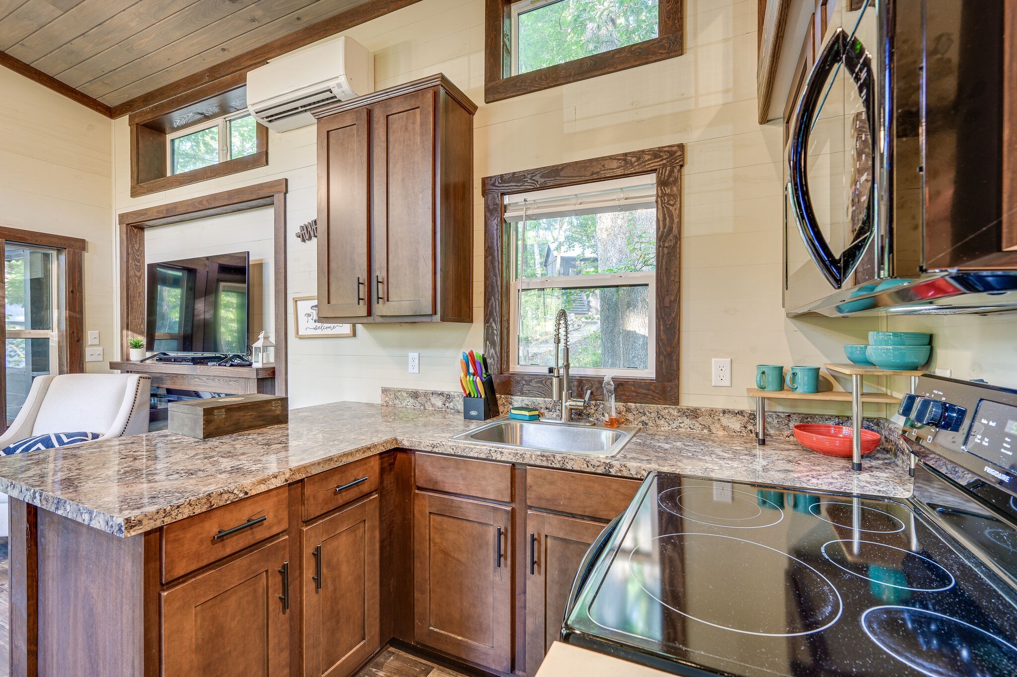 30 Oakleaf Trail Tracy City, TN 37387 - Photo 16 of 50 a kitchen with a stove a sink and a microwave