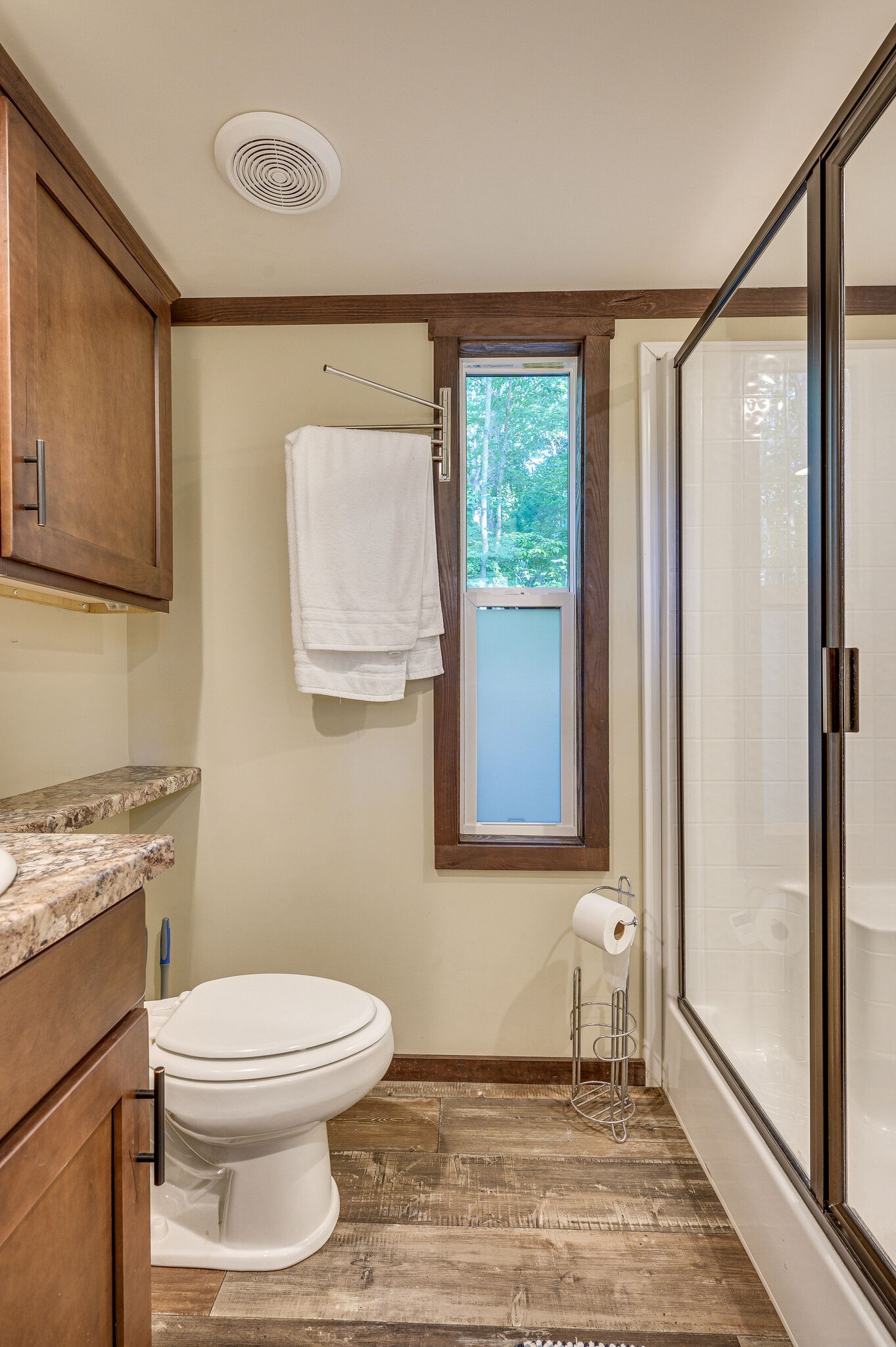 30 Oakleaf Trail Tracy City, TN 37387 - Photo 21 of 50 a bathroom with a toilet a sink and a window