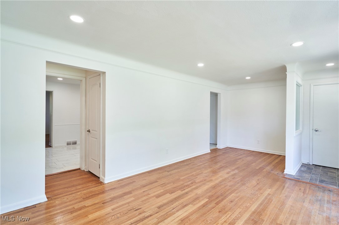 4037 Suffolk Road Cleveland, OH 44121 - Photo 8 of 26 Unfurnished room featuring light hardwood / wood-style flooring