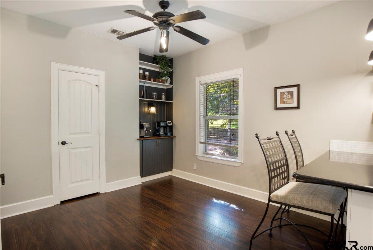 19577 Dove Ridge Lane Lindale, TX 75771 - Photo 12 of 42 a view of a livingroom with furniture ceiling fan and wooden floor