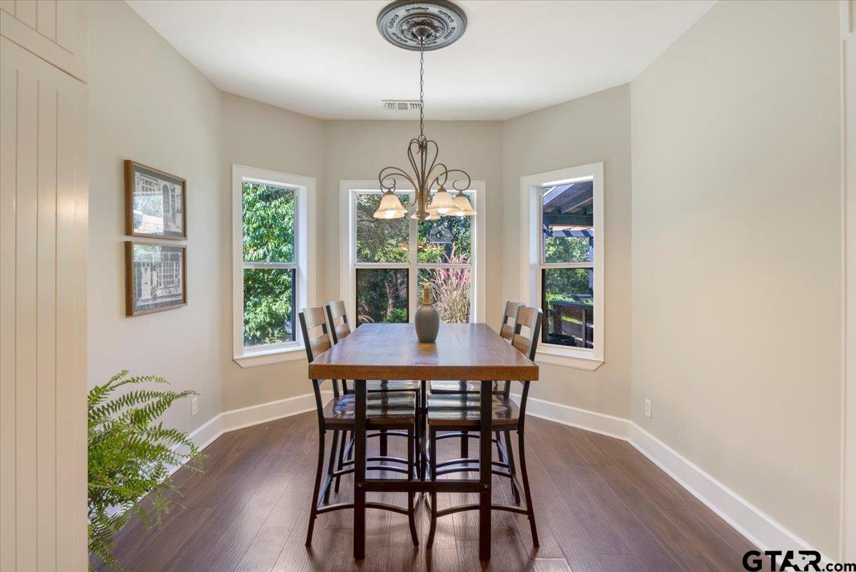 19577 Dove Ridge Lane Lindale, TX 75771 - Photo 13 of 42 a view of a dining room with furniture window and wooden floor