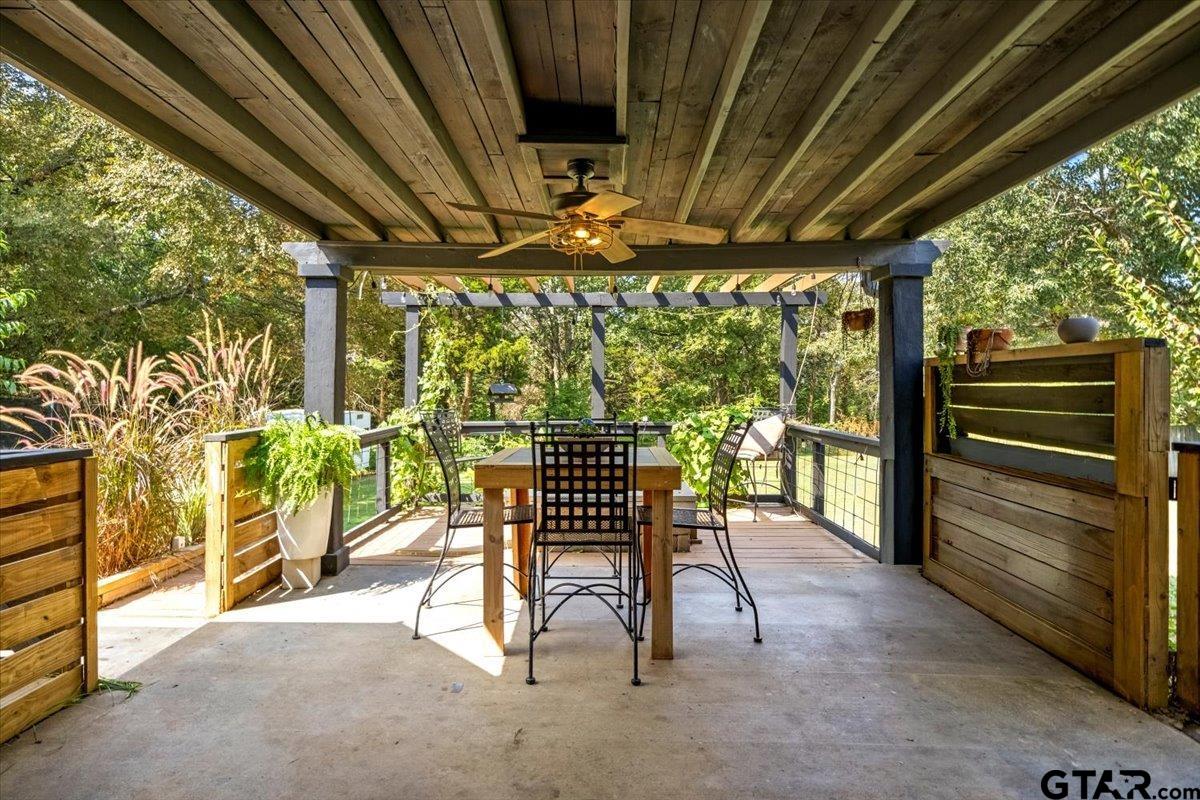 19577 Dove Ridge Lane Lindale, TX 75771 - Photo 33 of 42 a view of a two chairs in the roof deck