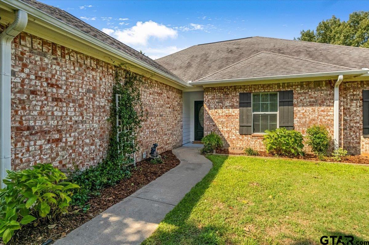 19577 Dove Ridge Lane Lindale, TX 75771 - Photo 4 of 42 a front view of a house with garden