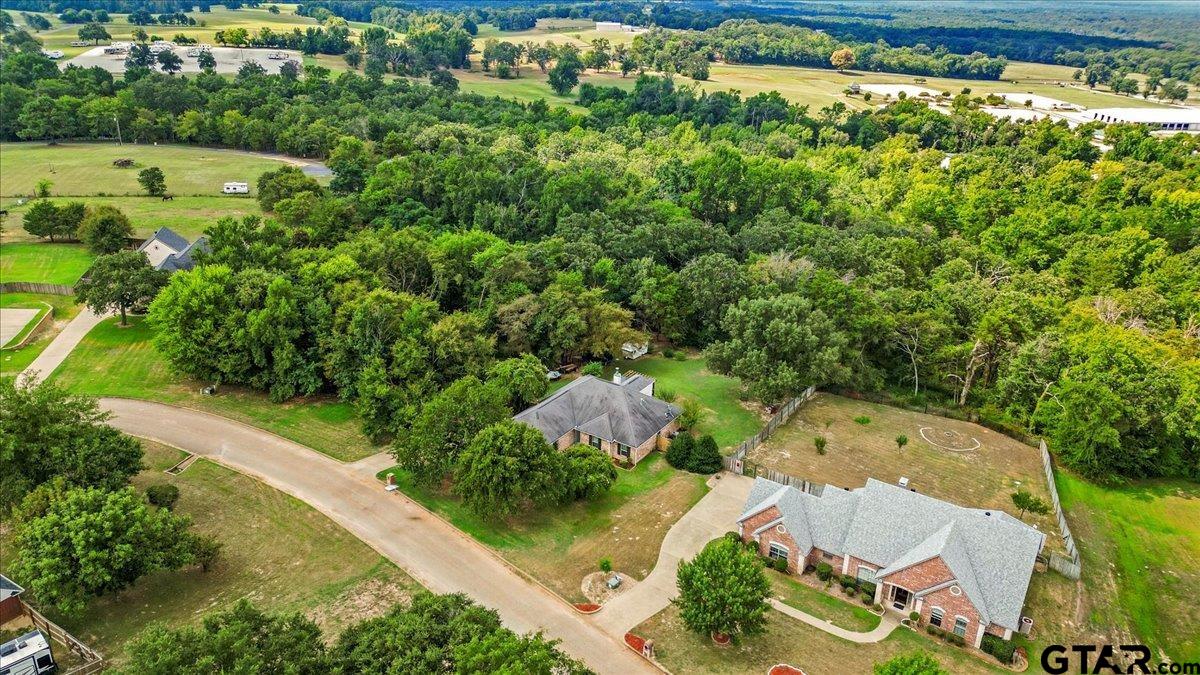 19577 Dove Ridge Lane Lindale, TX 75771 - Photo 41 of 42 an aerial view of a house with a yard and lake view