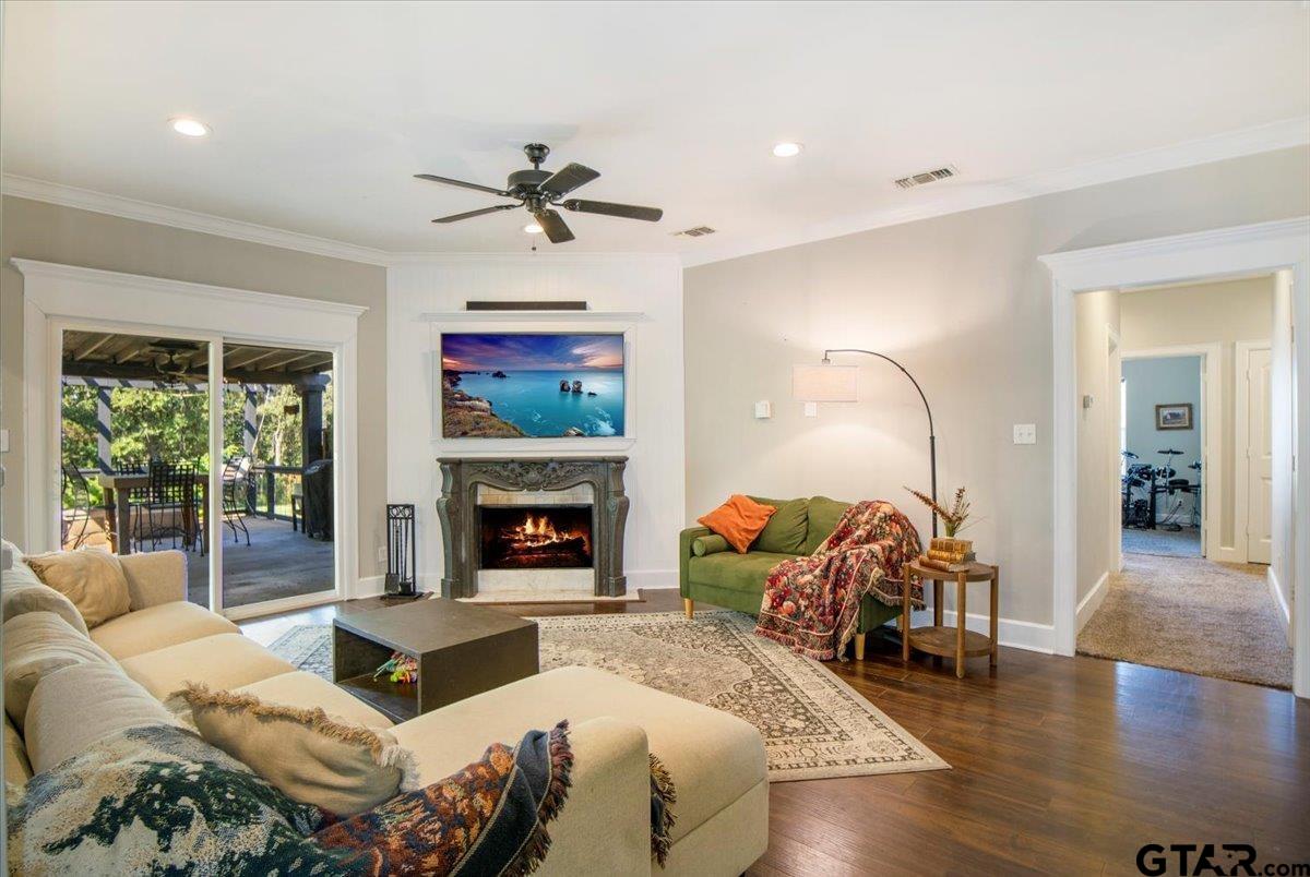 19577 Dove Ridge Lane Lindale, TX 75771 - Photo 6 of 42 a living room with furniture and a fireplace