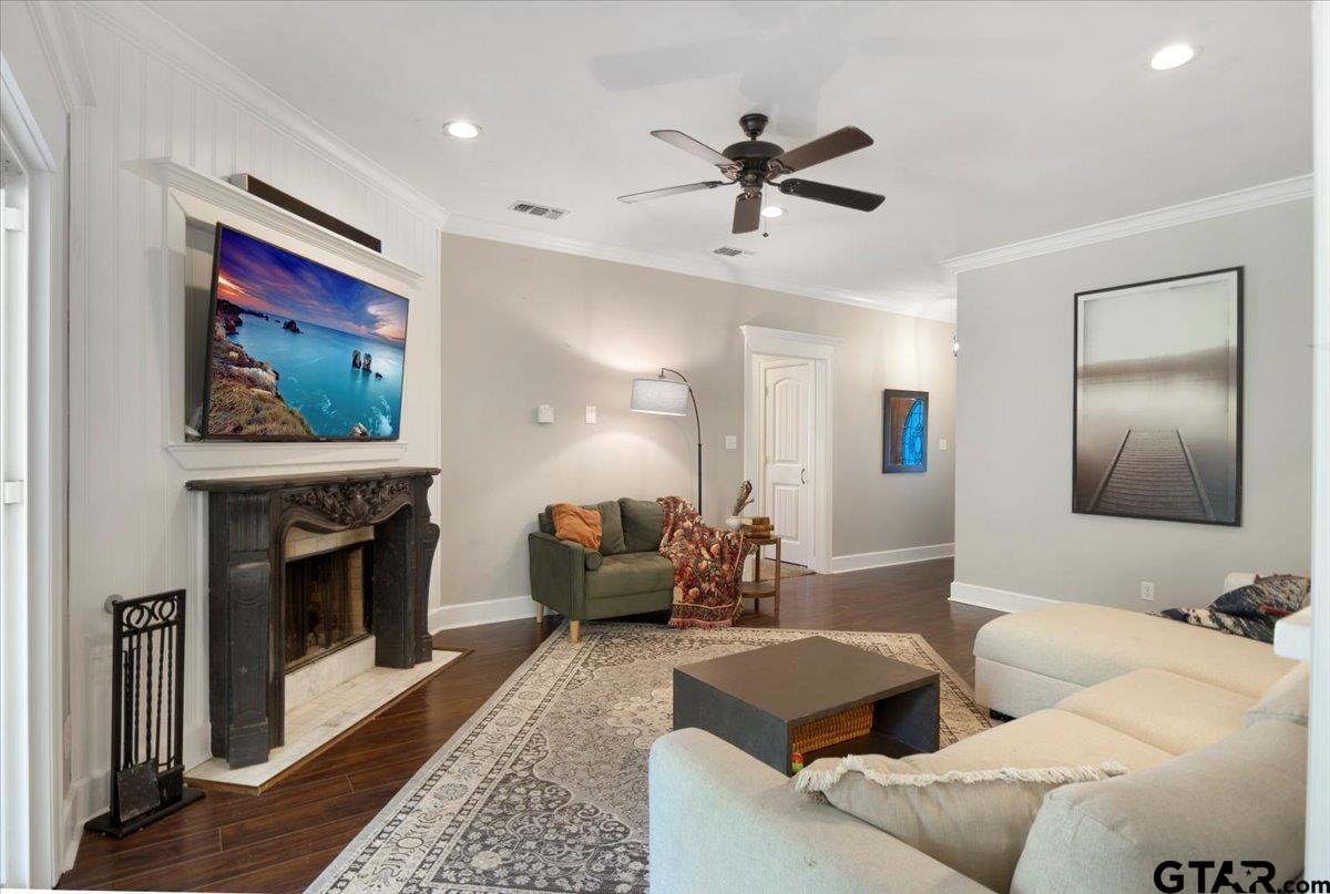 19577 Dove Ridge Lane Lindale, TX 75771 - Photo 7 of 42 a living room with furniture and a fireplace