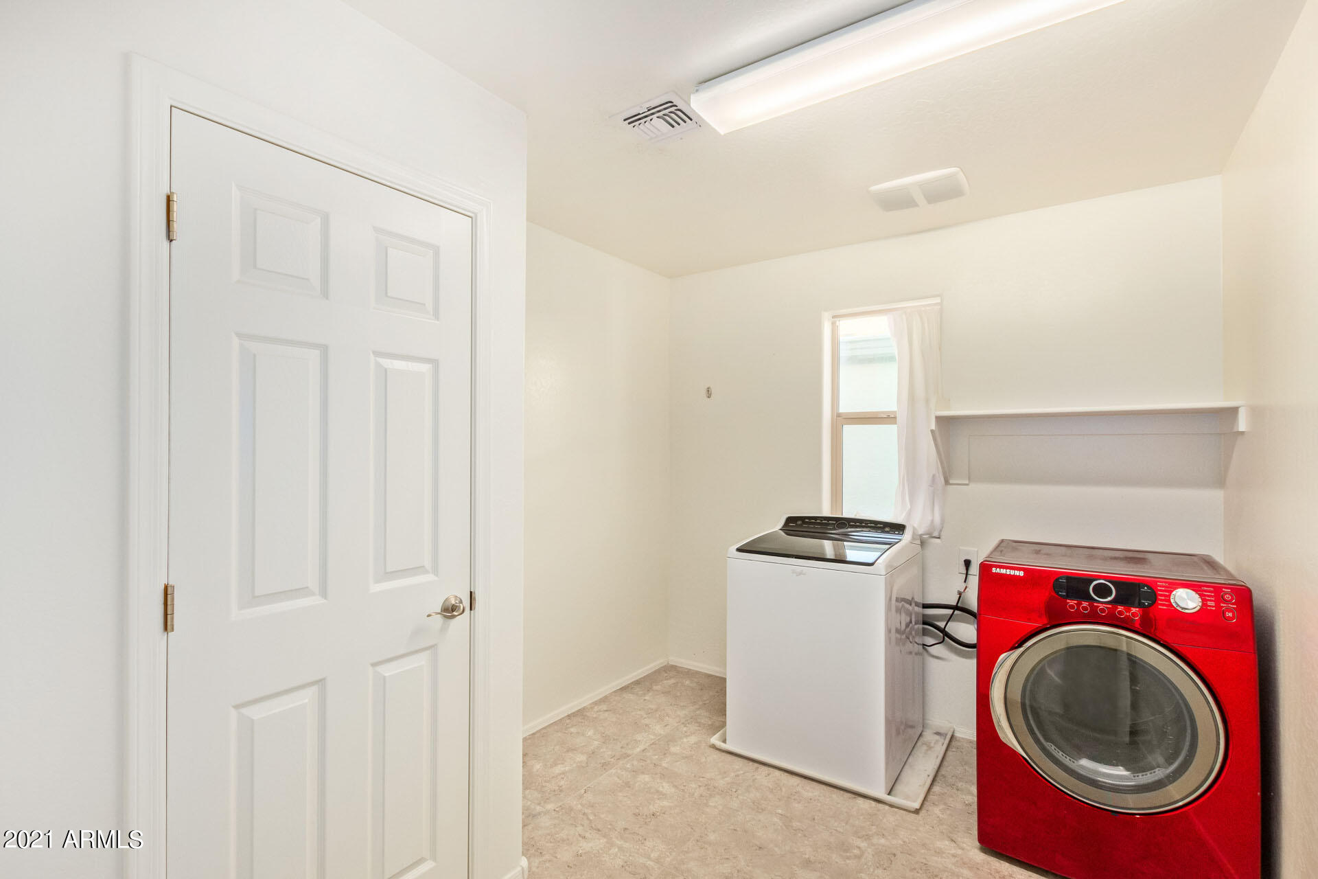 21196 West Coronado Road Buckeye, AZ 85396 - Photo 24 of 26 Laundry room with Linen Closet