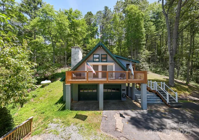 a view of house with yard entertaining space and furniture