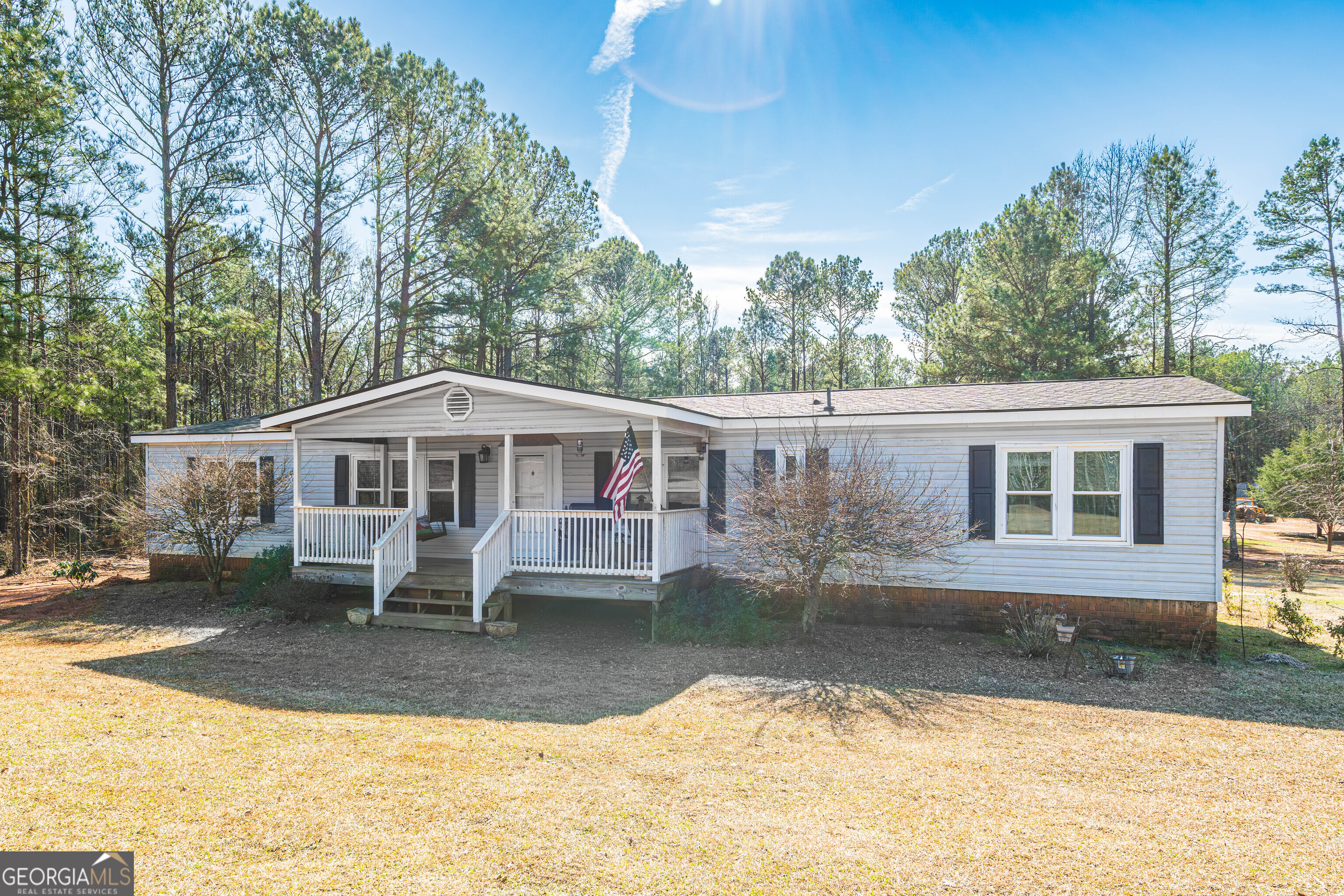 161 Cherokee Trail Forsyth, GA 31029 - Photo 1 of 39 a front view of a house with swimming pool