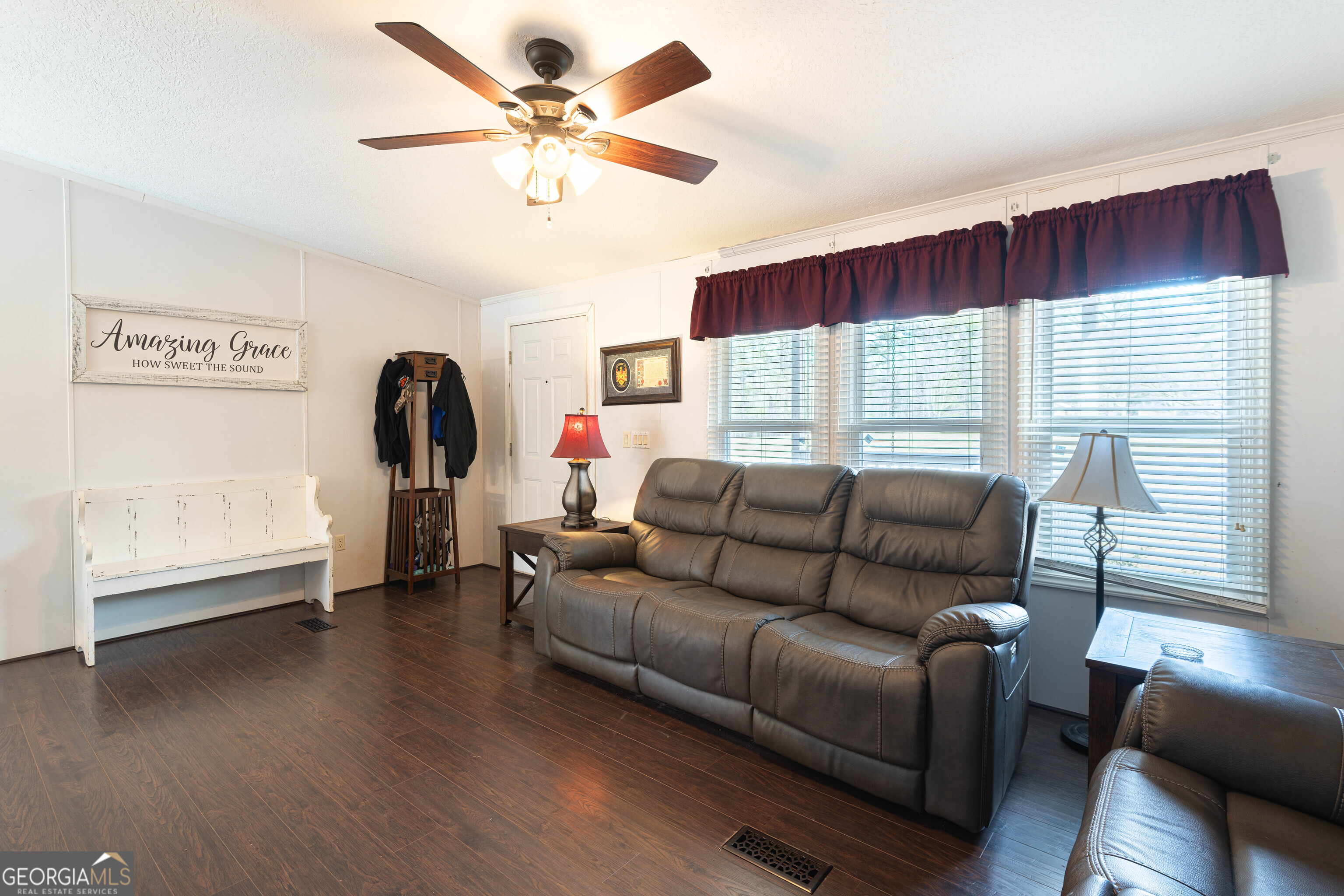 161 Cherokee Trail Forsyth, GA 31029 - Photo 25 of 39 a living room with furniture and a large window
