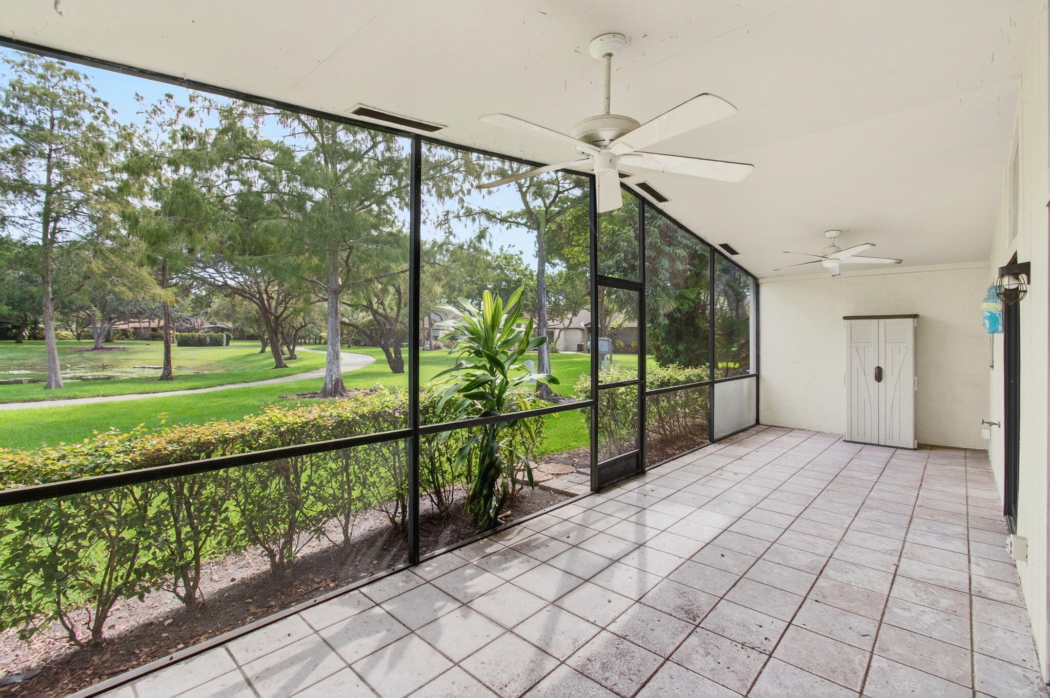 11609 Orange Blossom Lane Boca Raton, FL 33428 - Photo 15 of 30 a view of a porch and garden