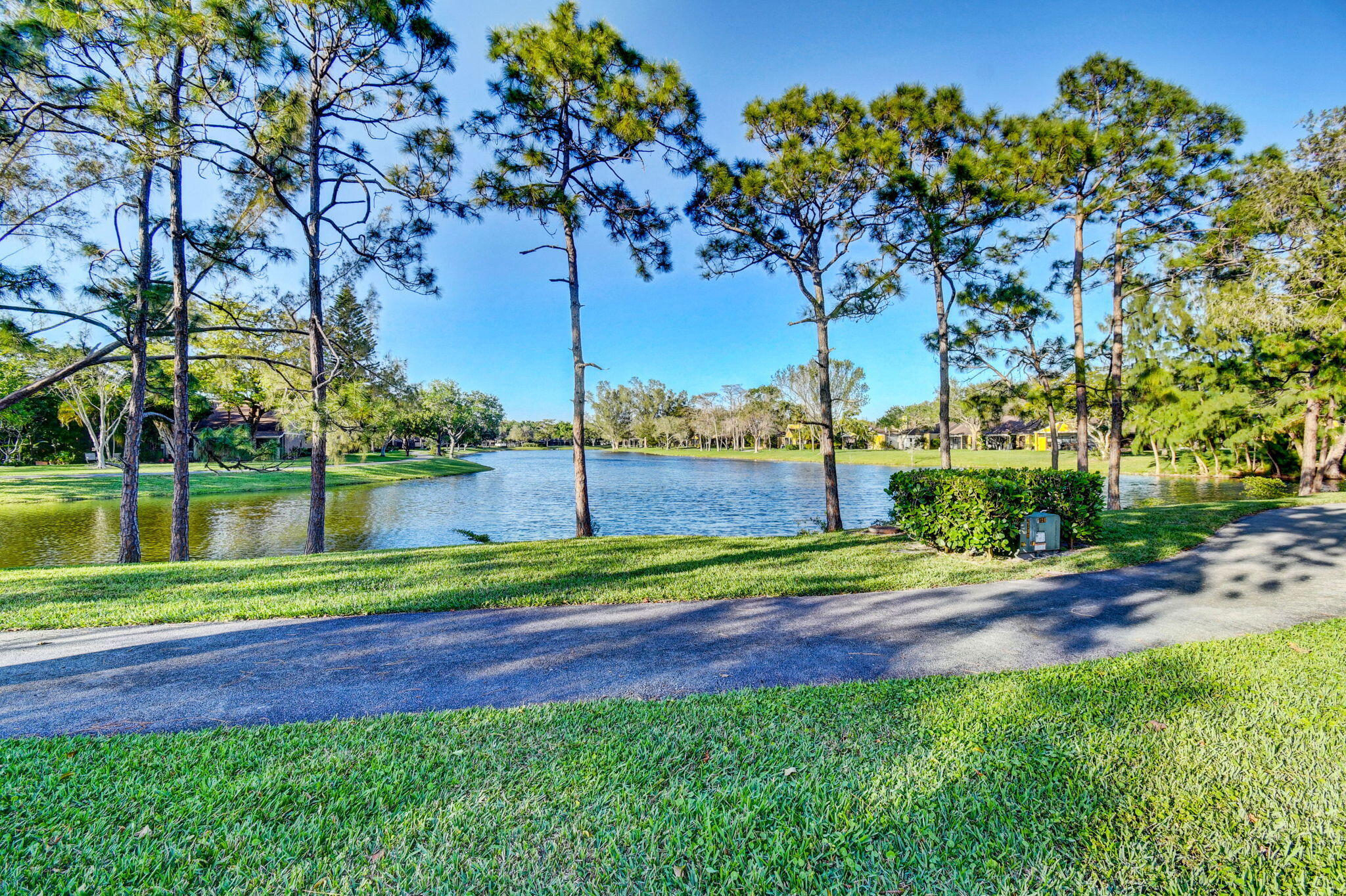 11609 Orange Blossom Lane Boca Raton, FL 33428 - Photo 21 of 30 a view of a park and trees with a big yard