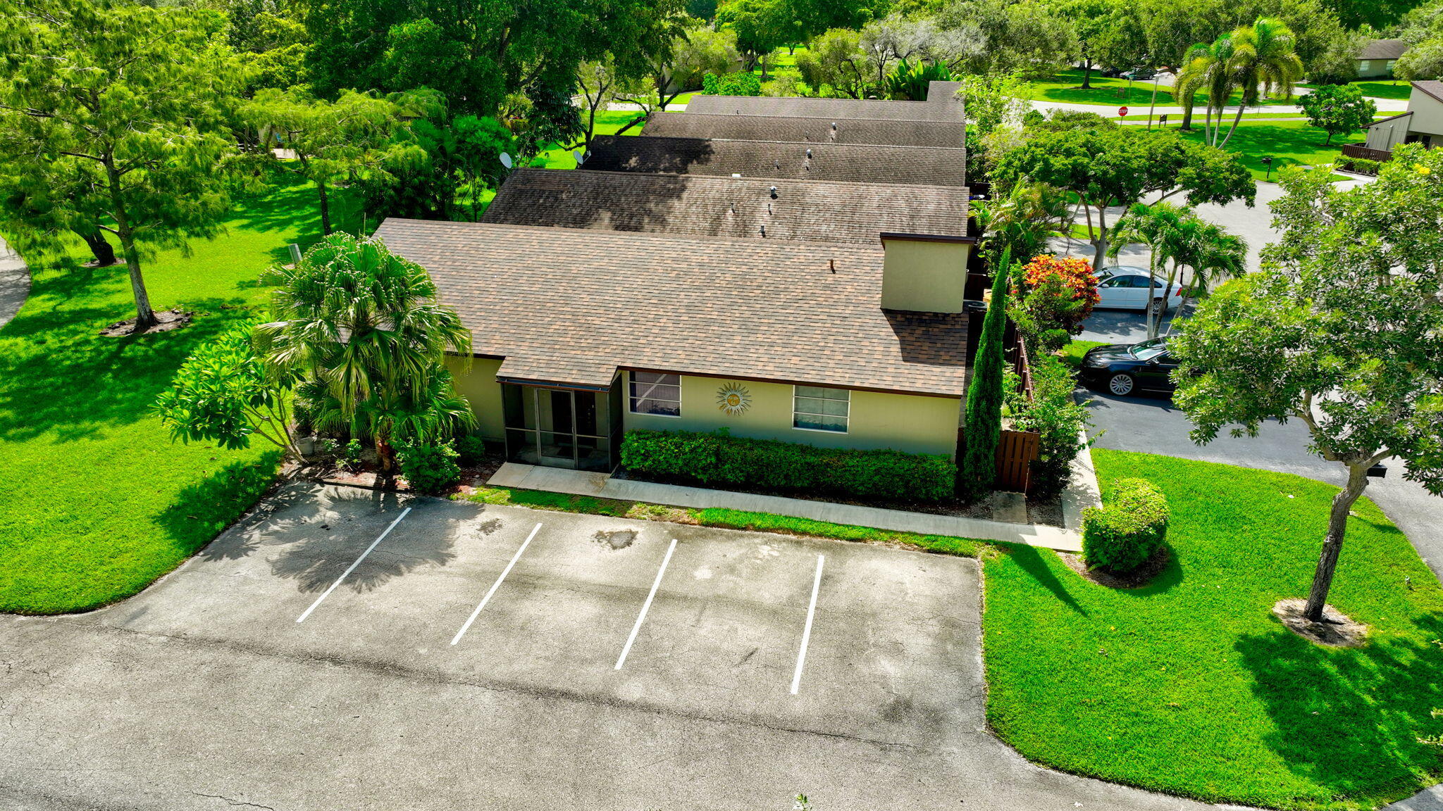 11609 Orange Blossom Lane Boca Raton, FL 33428 - Photo 22 of 30 an aerial view of a house with a yard and potted plants