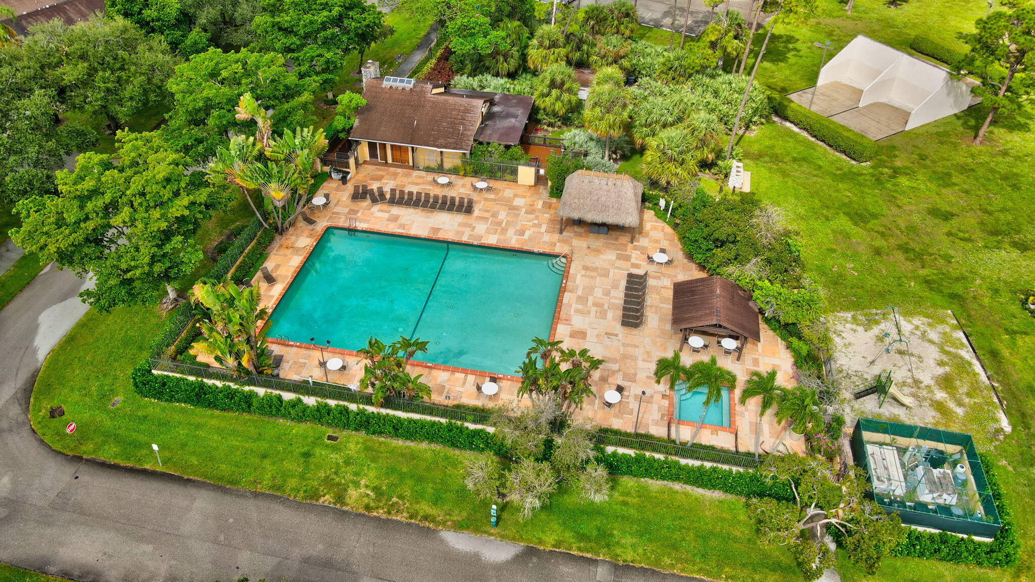 11609 Orange Blossom Lane Boca Raton, FL 33428 - Photo 26 of 30 an aerial view of a house with a garden and trees