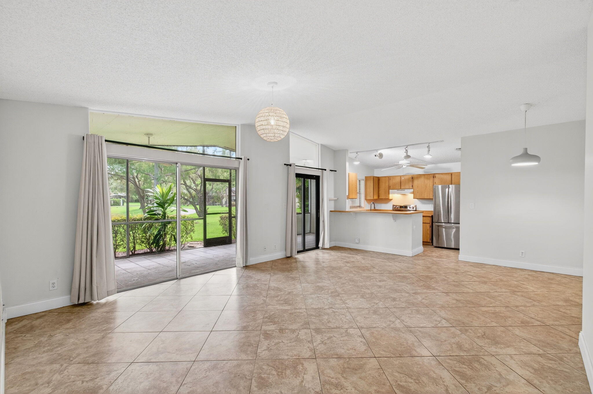 11609 Orange Blossom Lane Boca Raton, FL 33428 - Photo 29 of 30 a view of a kitchen with a sink and a window