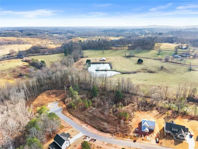 a view of a yard with an trees
