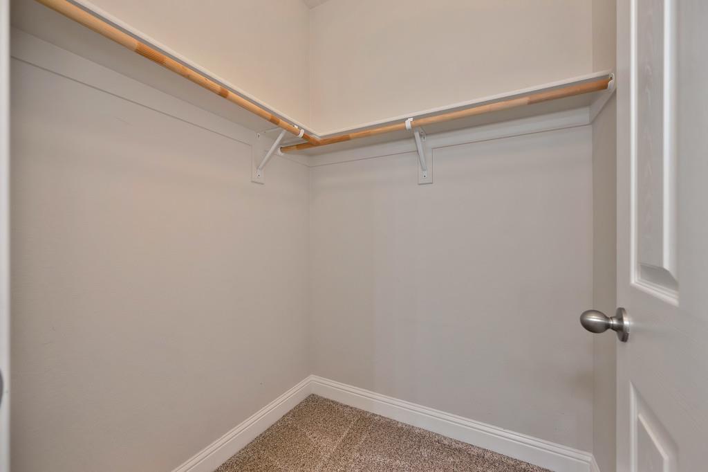 1964 Hartsfield Way Lincoln, CA 95648 - Photo 23 of 37 a view of a room with racks on the wall