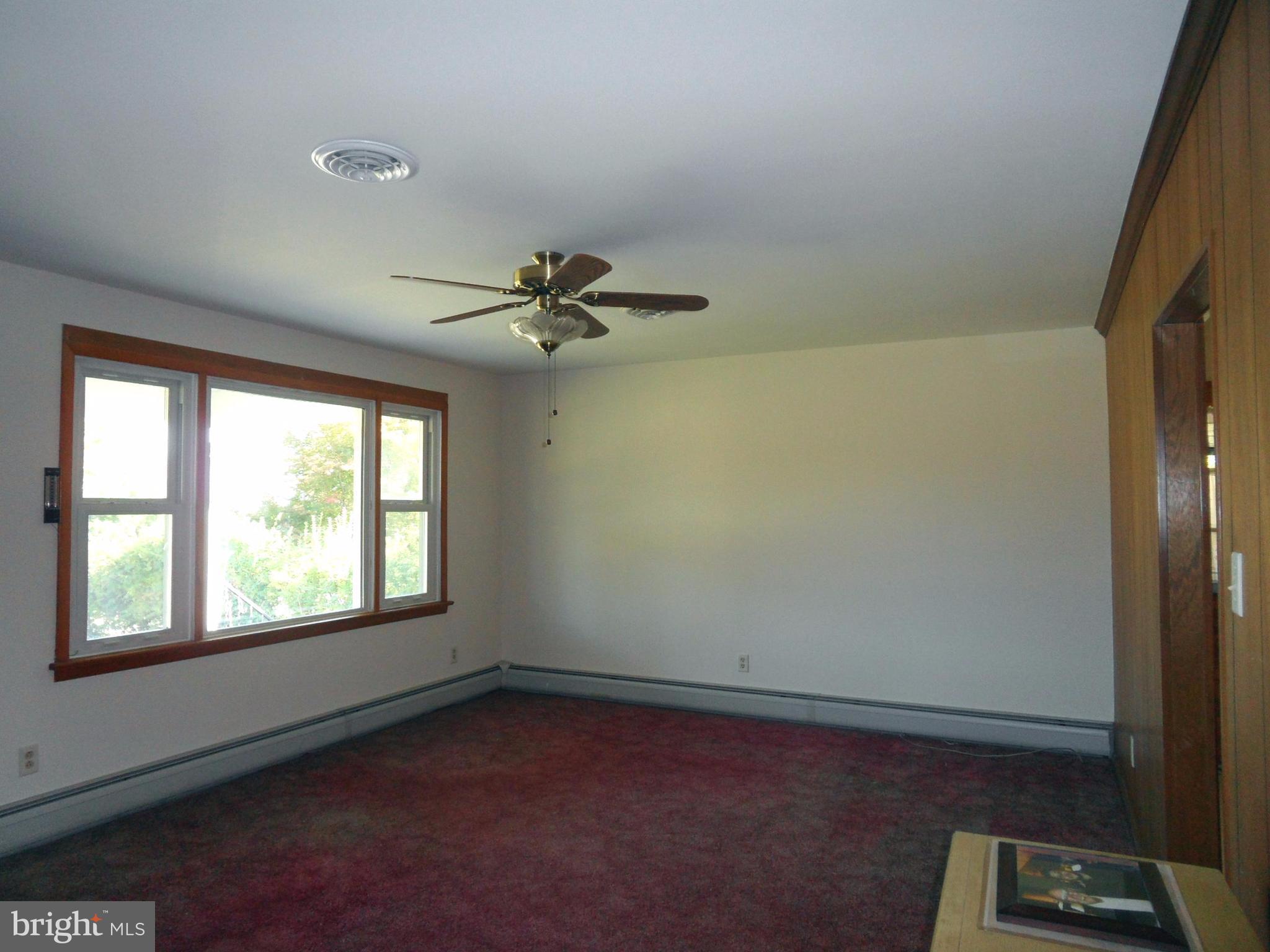 5976 Grove Hill Road Frederick, MD 21703 - Photo 8 of 15 Hardwood flooring under carpet