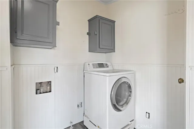 a view of a room with wooden walls