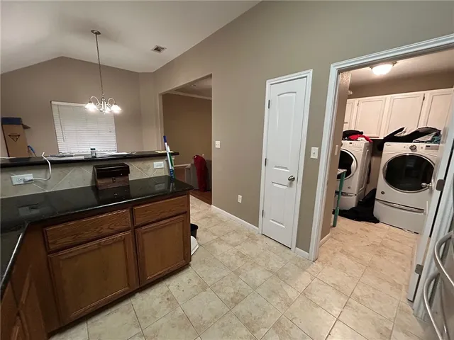 a view of a storage and utility room