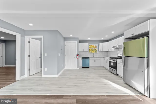 a view of kitchen with wooden floor