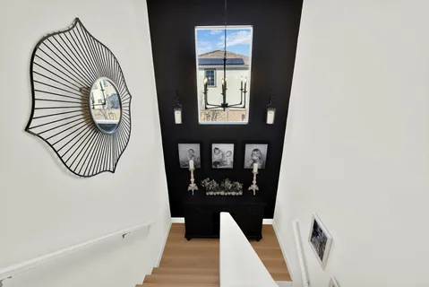 a view of entryway with wooden floor