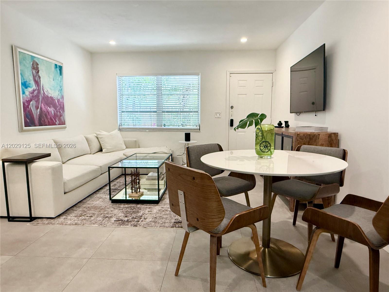 547 Northeast 64th Street, Unit 2 Miami, FL 33138 - Photo 1 of 14 Dining Area & Living Area