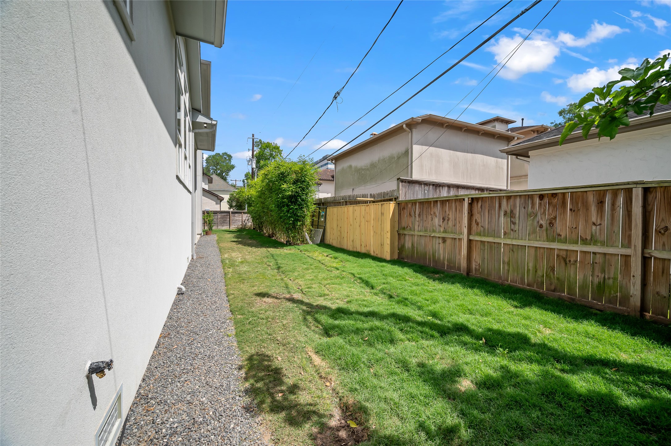 2215 MacArthur Street Houston, TX 77030 - Photo 18 of 33 Backyard - facing southeast. There is space for a linear-shaped pool or a 'plunge pool'. Buyer shall verify easments and due diligence.