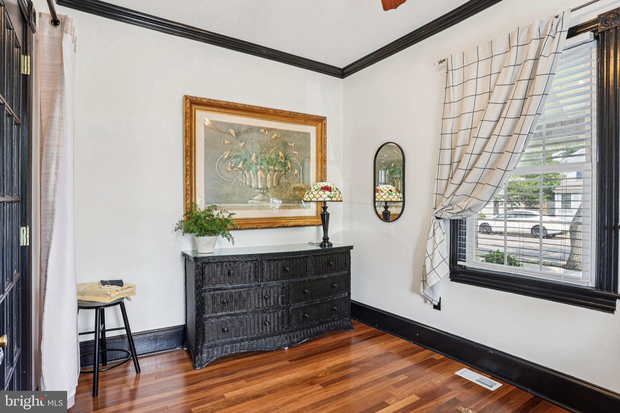 414 Broadway Cape May, NJ 08204 - Photo 29 of 48 a living room with furniture and a window