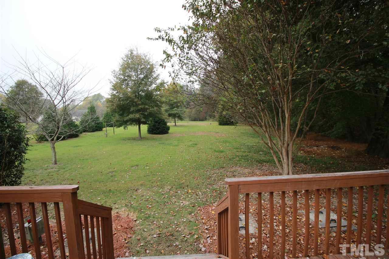 8808 Oregon Inlet Court Raleigh, NC 27603 - Photo 5 of 19 a view of a wooden fence