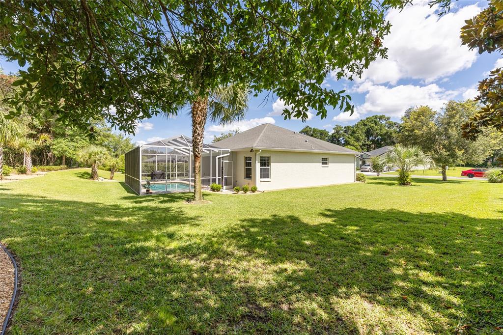 19639 Southwest 77th Loop Dunnellon, FL 34432 - Photo 50 of 59 a front view of a house with a yard