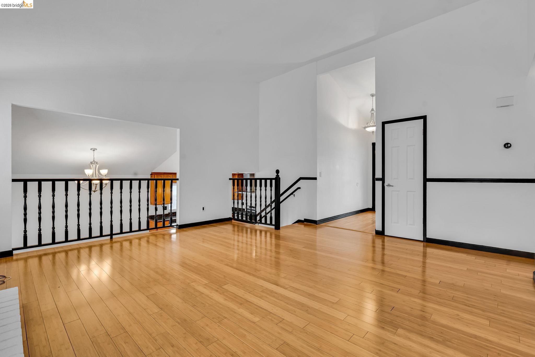 909 Halite Way Antioch, CA 94509 - Photo 21 of 52 a view of an empty room with wooden floor