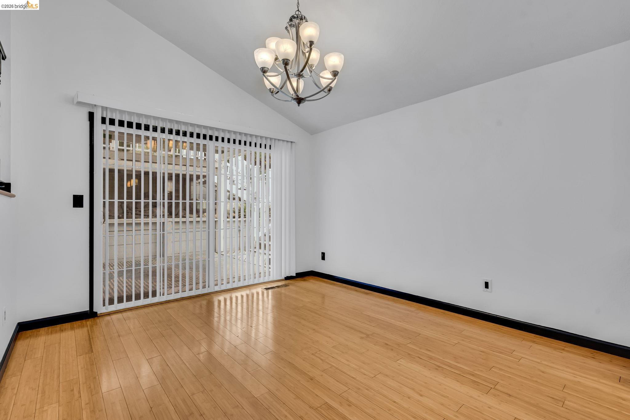 909 Halite Way Antioch, CA 94509 - Photo 29 of 52 a view of a room with wooden floor and a window