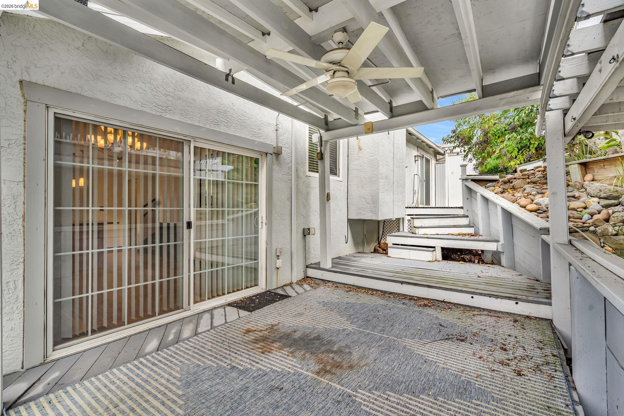 909 Halite Way Antioch, CA 94509 - Photo 38 of 52 a view of a porch with wooden floor and roof with a garden view