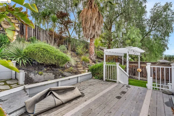 a view of a house with wooden stairs