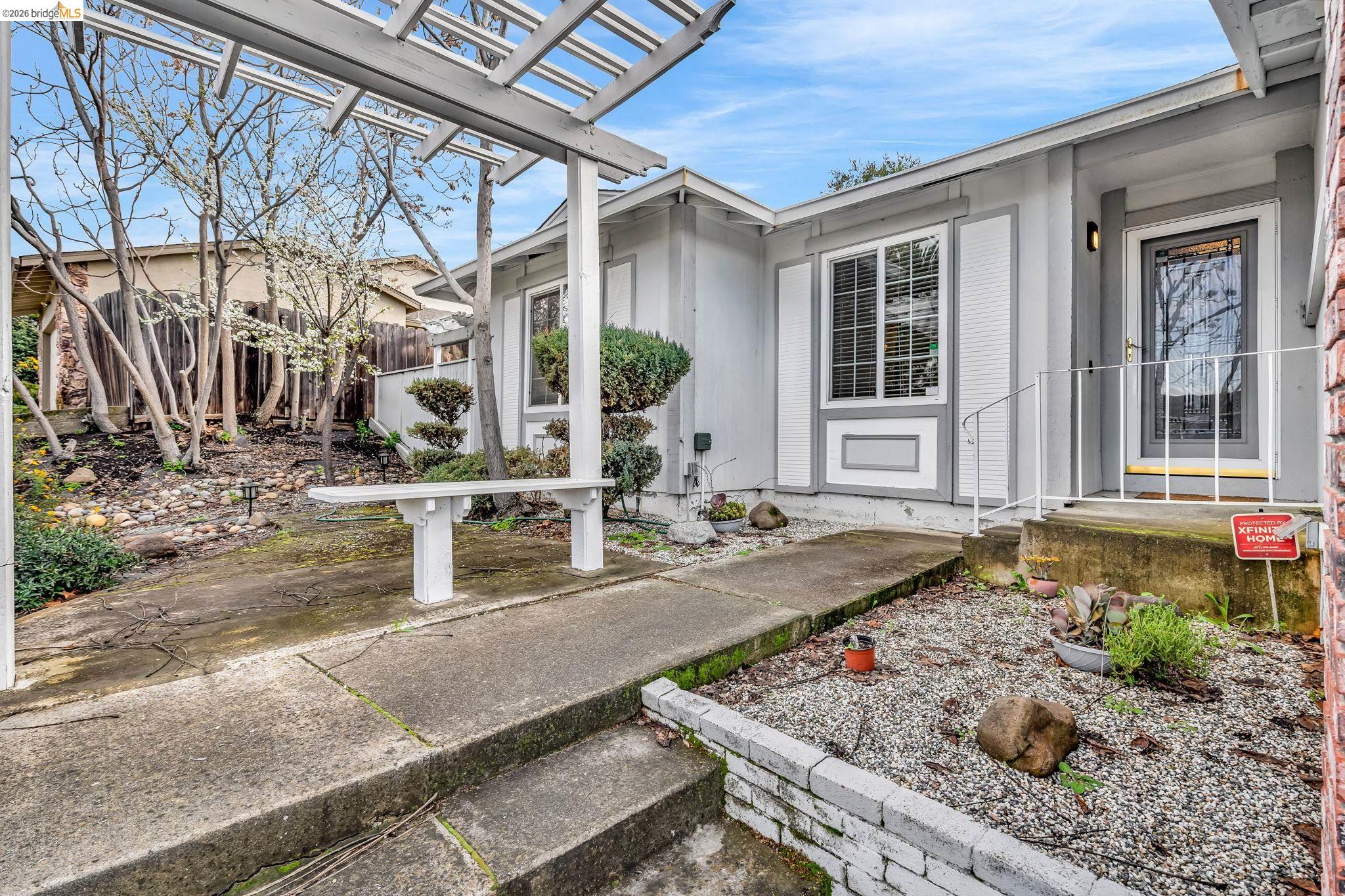 909 Halite Way Antioch, CA 94509 - Photo 6 of 52 a front view of a house with garden
