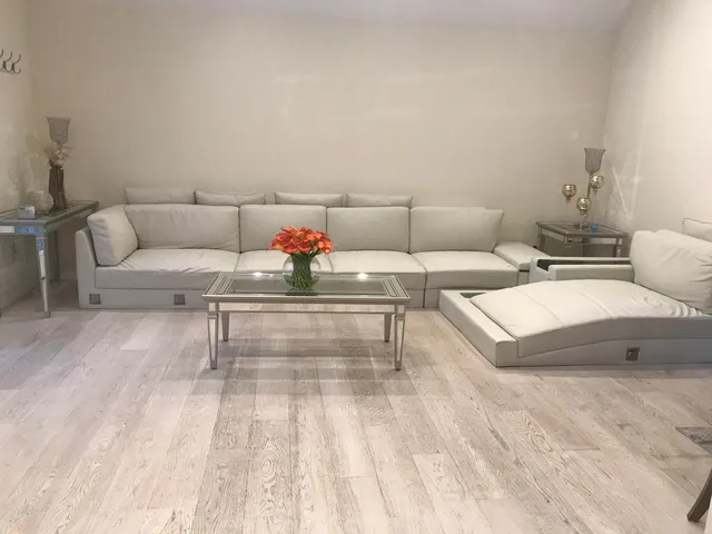 a living room with furniture and a couch