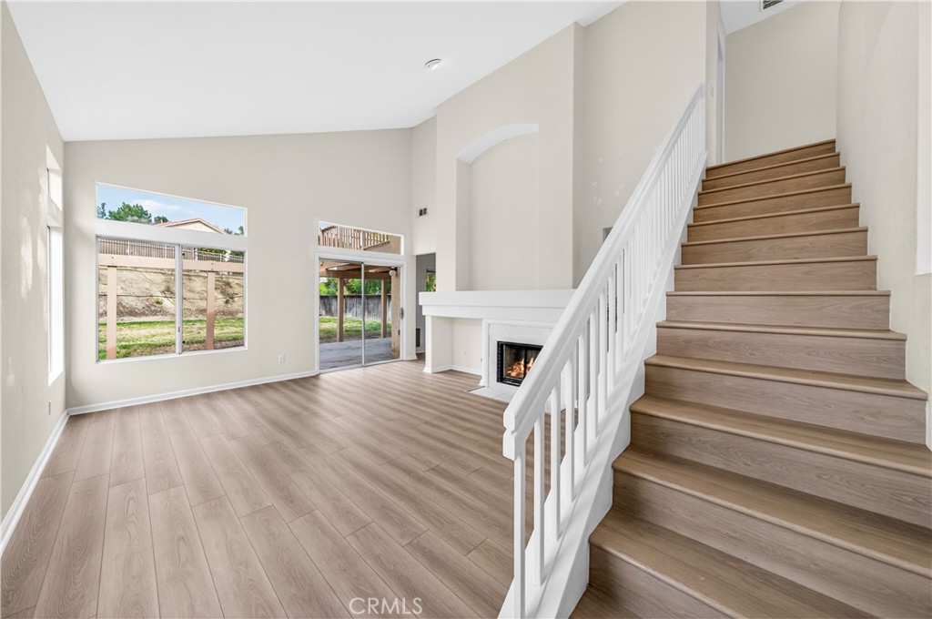 43425 Corte Logrono Temecula, CA 92592 - Photo 19 of 49 a view of entryway and hall with wooden floor