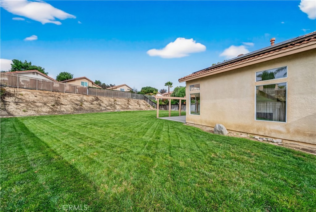 43425 Corte Logrono Temecula, CA 92592 - Photo 36 of 49 a backyard of a house with table and chairs