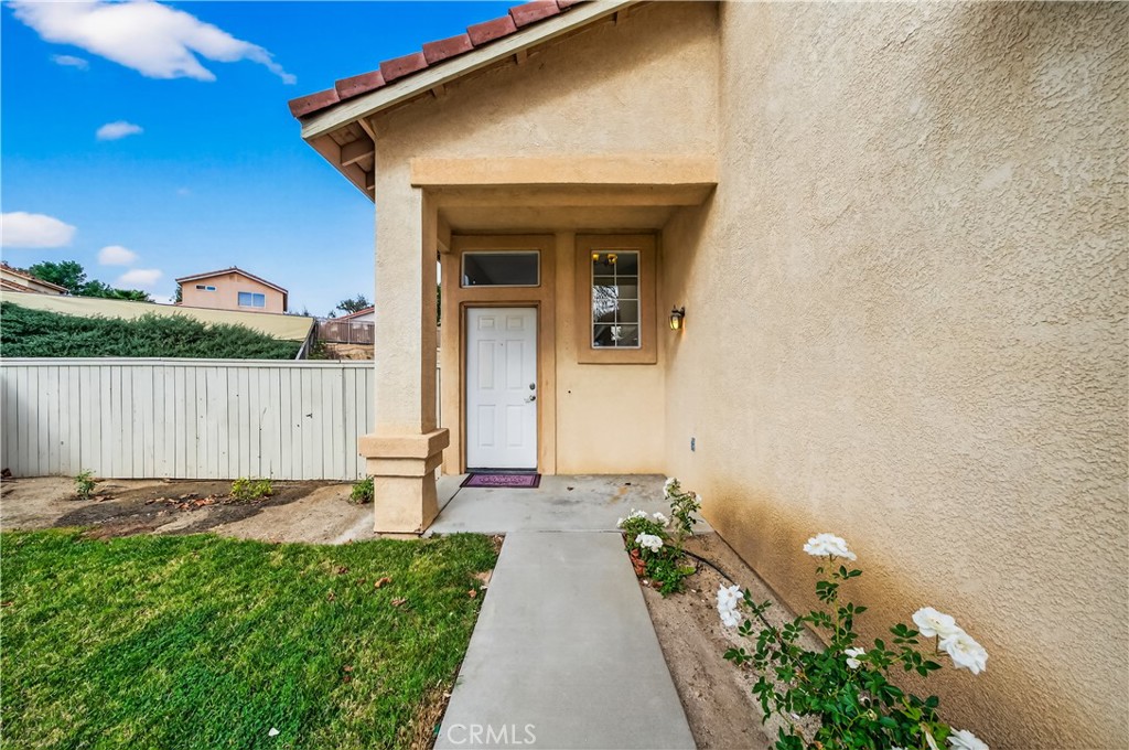 43425 Corte Logrono Temecula, CA 92592 - Photo 4 of 49 a front view of a house with a yard