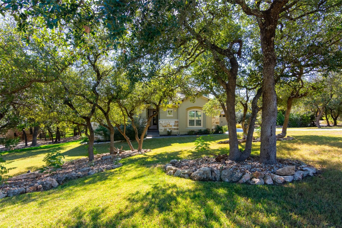 316 Chadwick Drive Georgetown, TX 78628 - Photo 2 of 39 a view of a house with swimming pool and sitting area