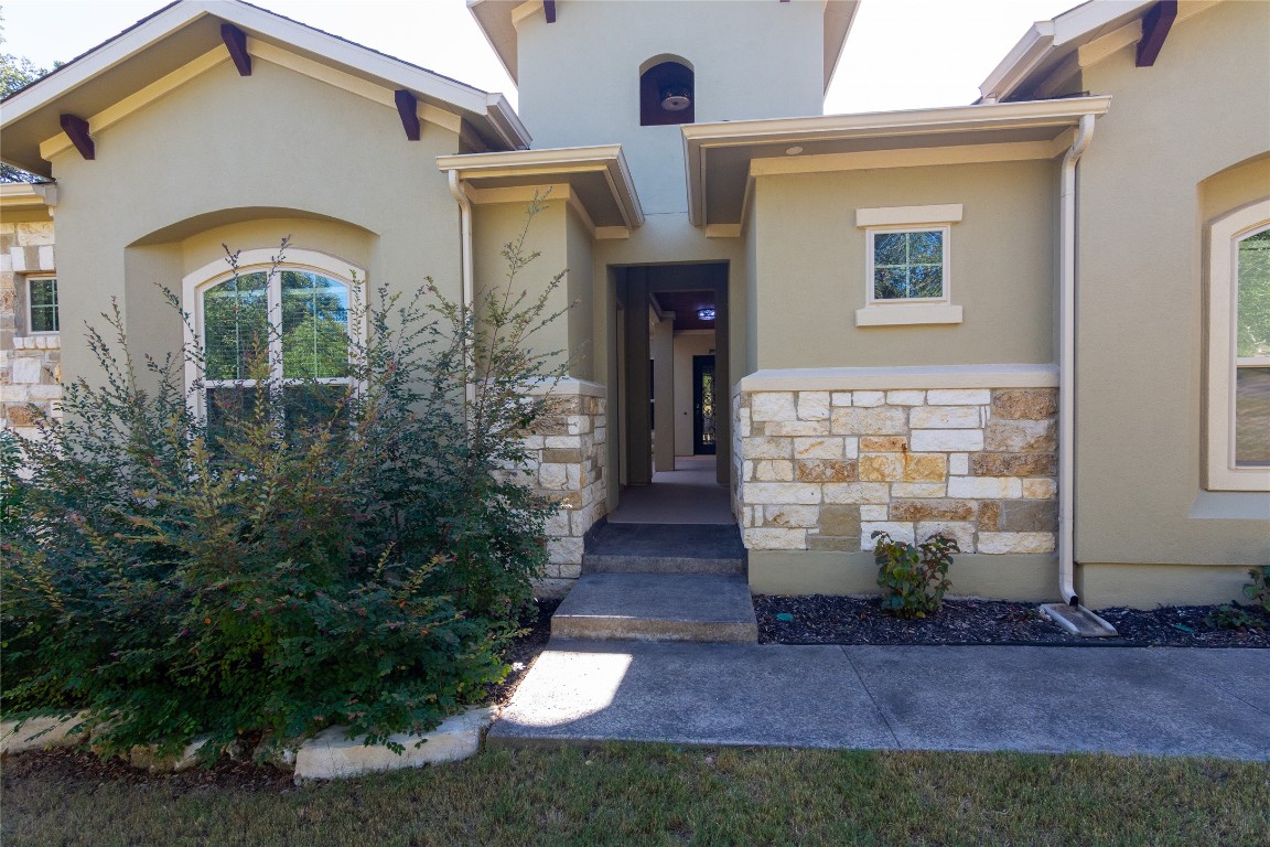 316 Chadwick Drive Georgetown, TX 78628 - Photo 3 of 39 a front view of a house with garden