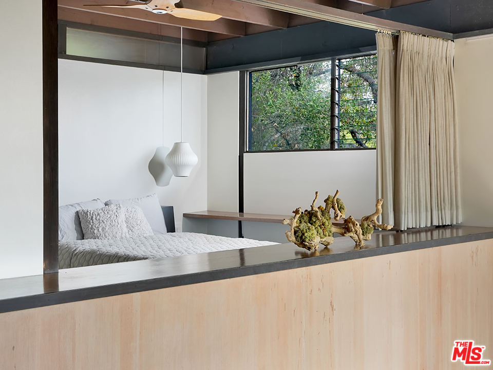 1617 Pleasant Way Pasadena, CA 91105 - Photo 13 of 38 a bathroom with a granite countertop sink and a mirror
