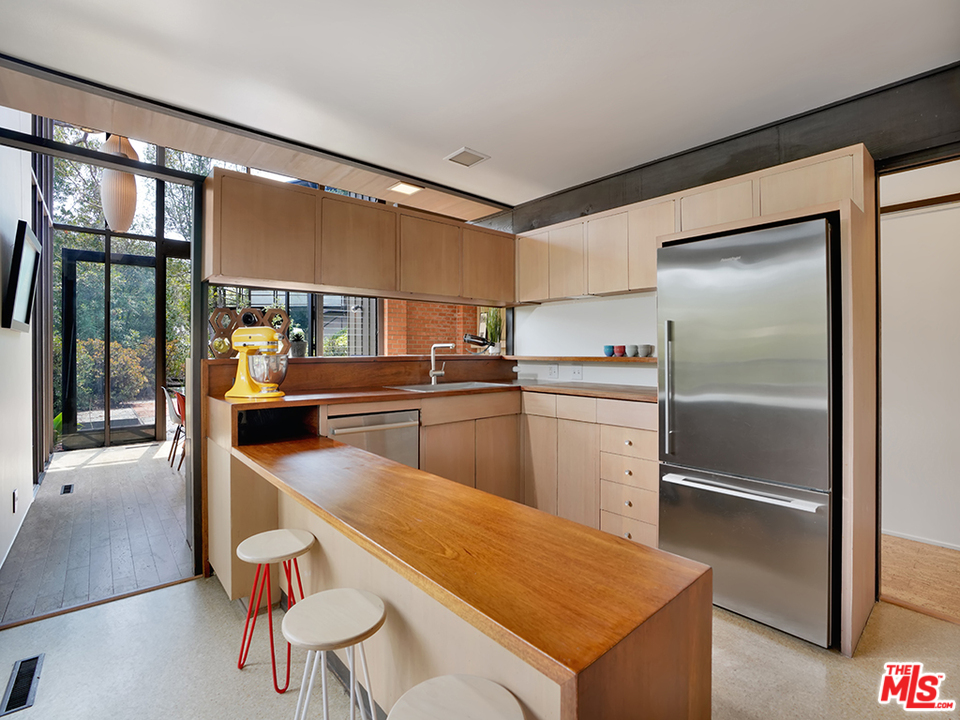 1617 Pleasant Way Pasadena, CA 91105 - Photo 17 of 38 a kitchen with a refrigerator and countertop