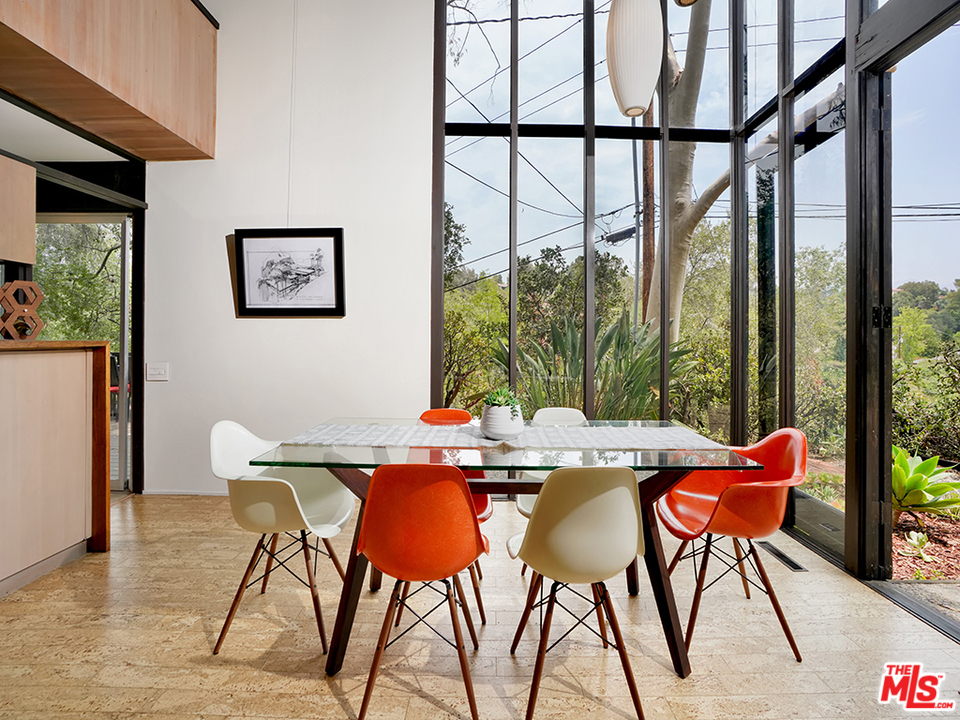 1617 Pleasant Way Pasadena, CA 91105 - Photo 21 of 38 a view of an outdoor dining space with furniture and wooden floor