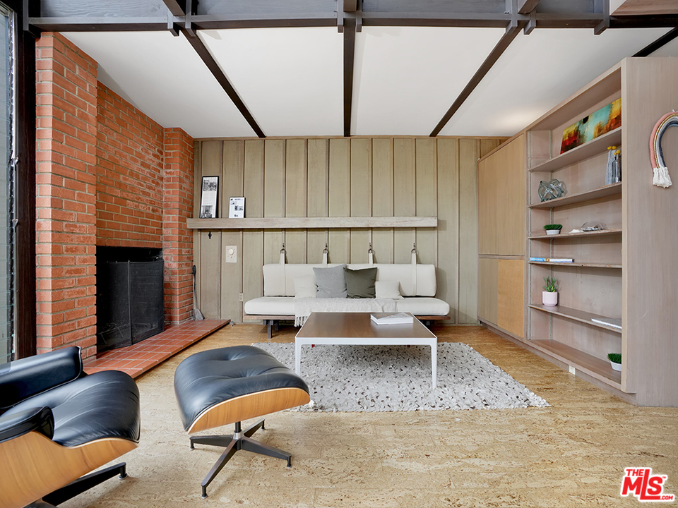 1617 Pleasant Way Pasadena, CA 91105 - Photo 24 of 38 a living room with furniture and a fireplace
