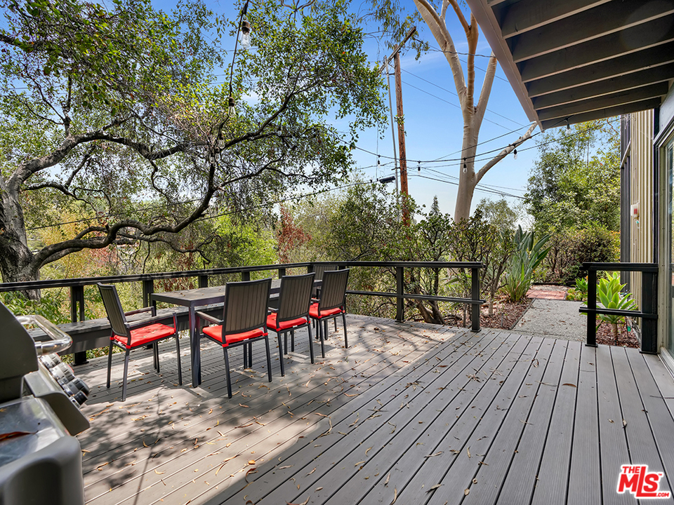 1617 Pleasant Way Pasadena, CA 91105 - Photo 35 of 38 a view of a deck with wooden floor and outdoor seating