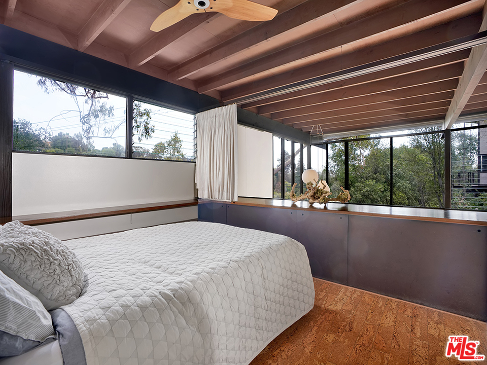 1617 Pleasant Way Pasadena, CA 91105 - Photo 5 of 38 a bedroom with a large bed and a large window