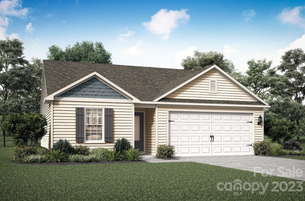 1309 Nia Road Charlotte, NC 28215 - Photo 1 of 2 a front view of a house with a yard